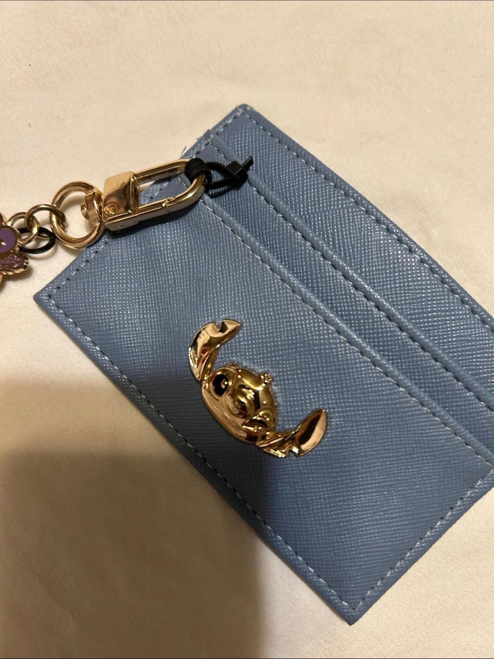 Disney Blue Card Holder Keychain with Gold Crab Charm and Purple Flower Tag